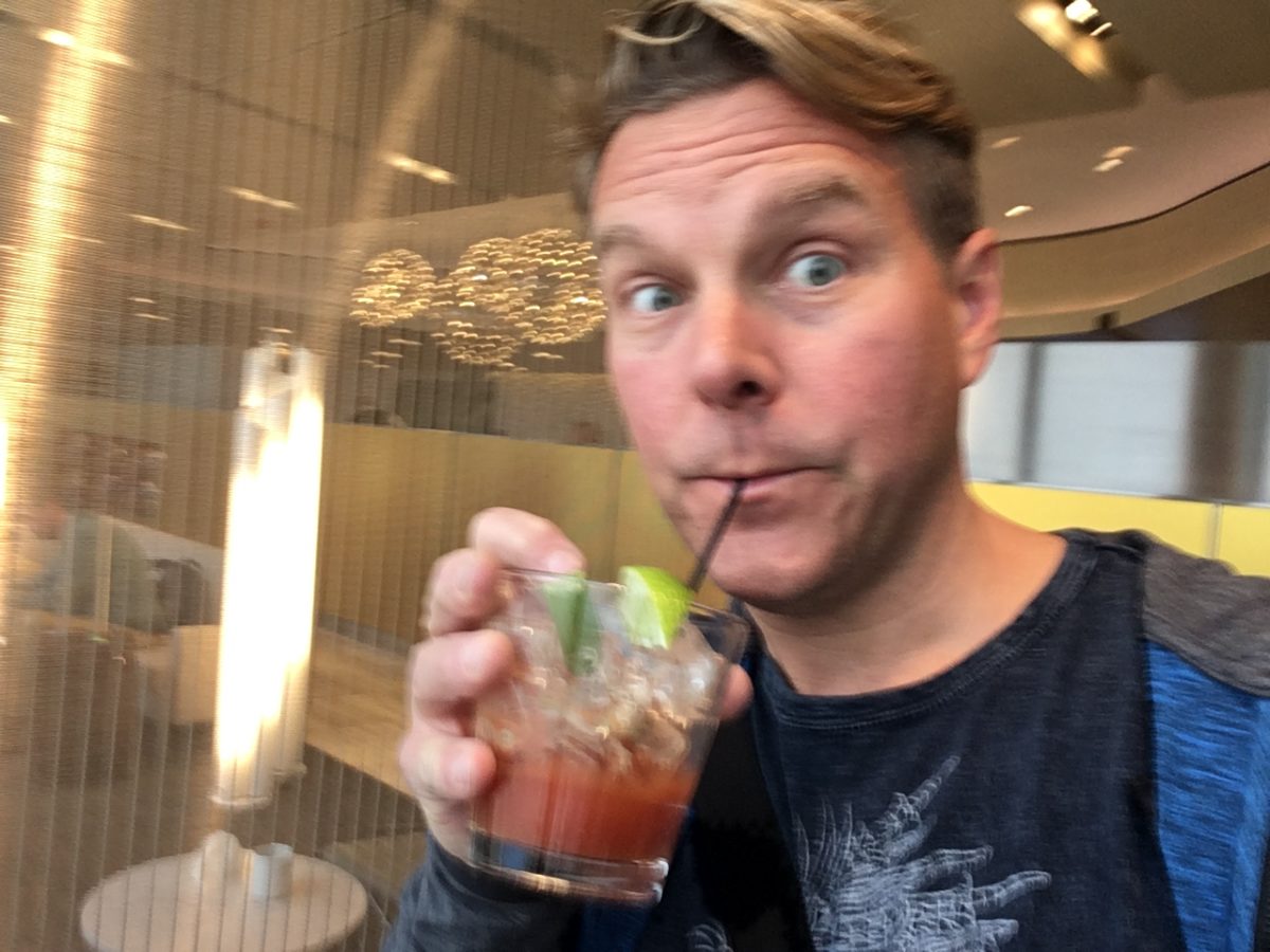 Enjoying a Bloody Mary in the United Lounge