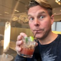 Enjoying a Bloody Mary in the United Lounge